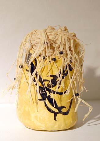 Hand formed vase with raffia and Lizard designs